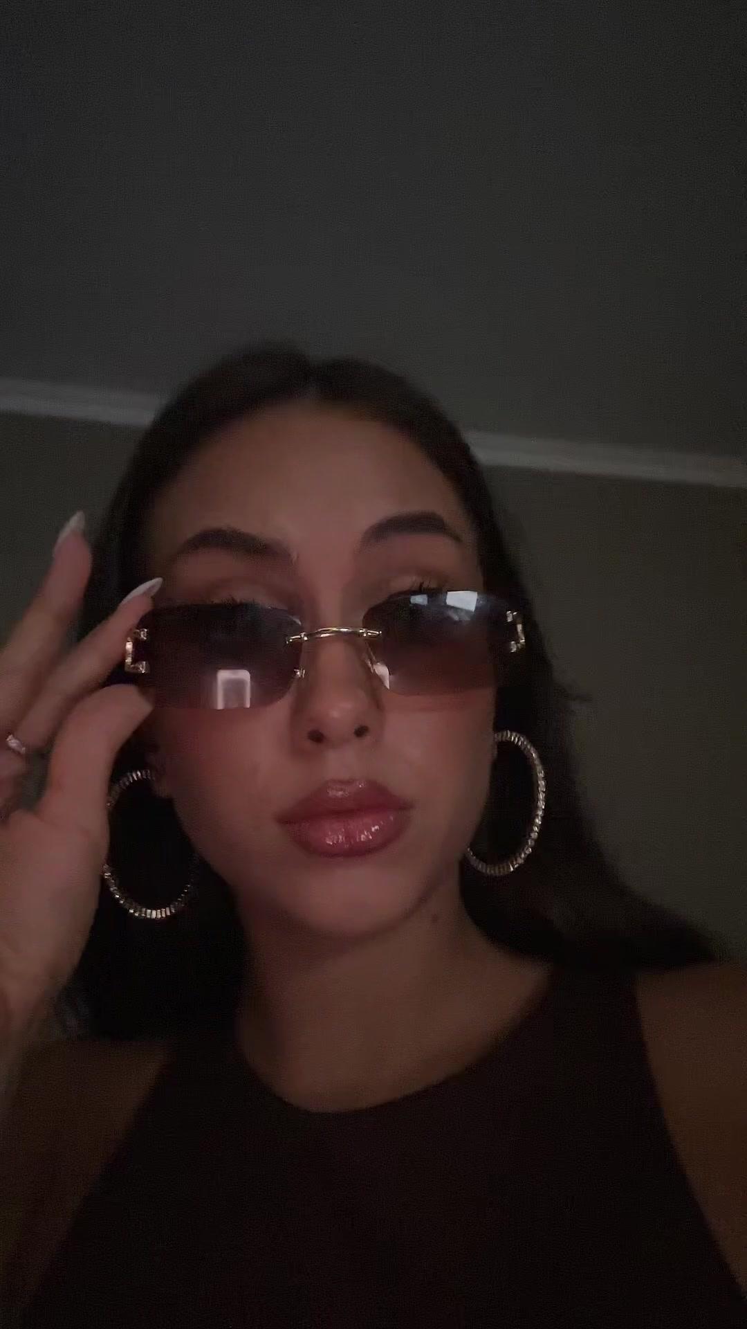 Confident Girl Posing in Sunglasses